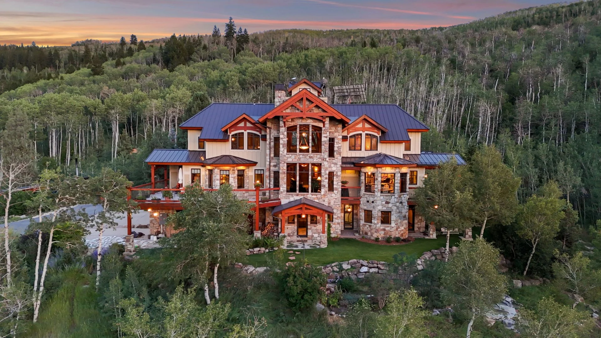 Mountain retreat surrounded by aspens and forest