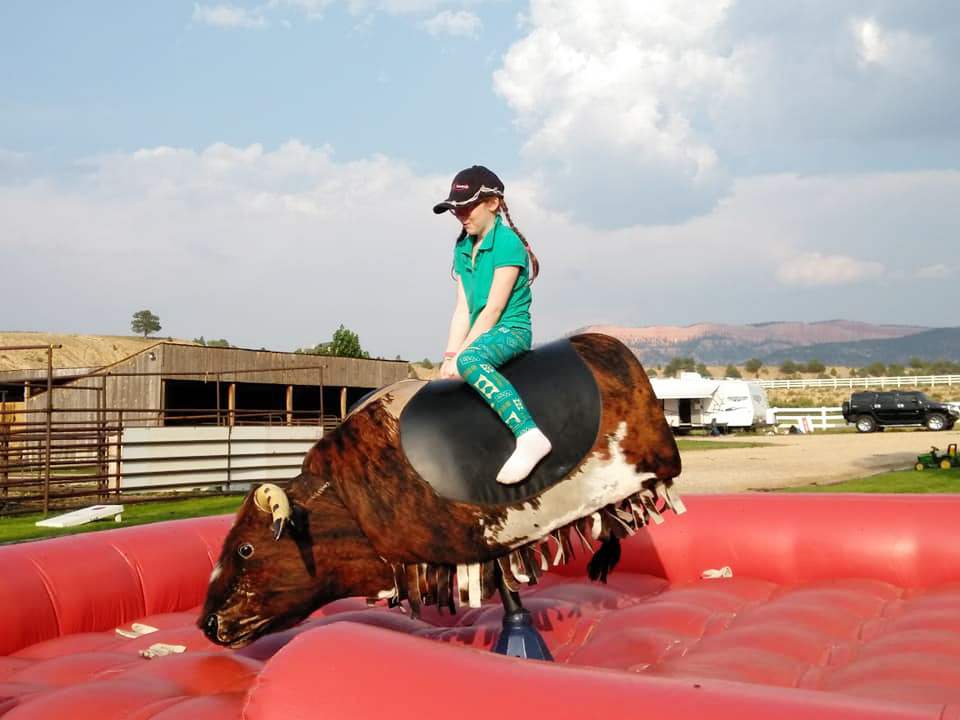 Mechanical bull riding at NAI retreat
