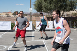 NAI Vegas team playing defense in Charity Basketball Tournament