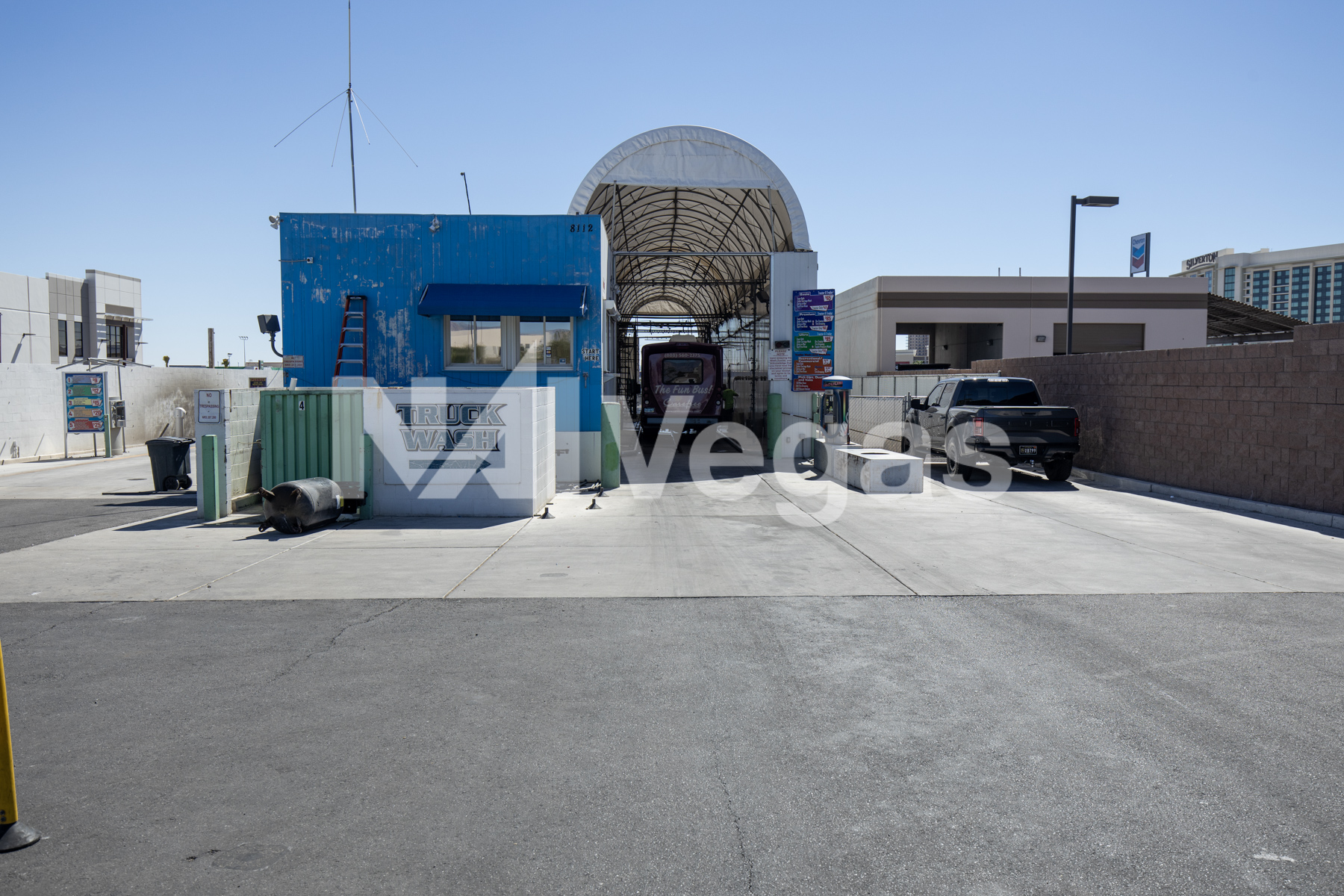 Car wash entrance tunnel on commercial real estate property in Las Vegas