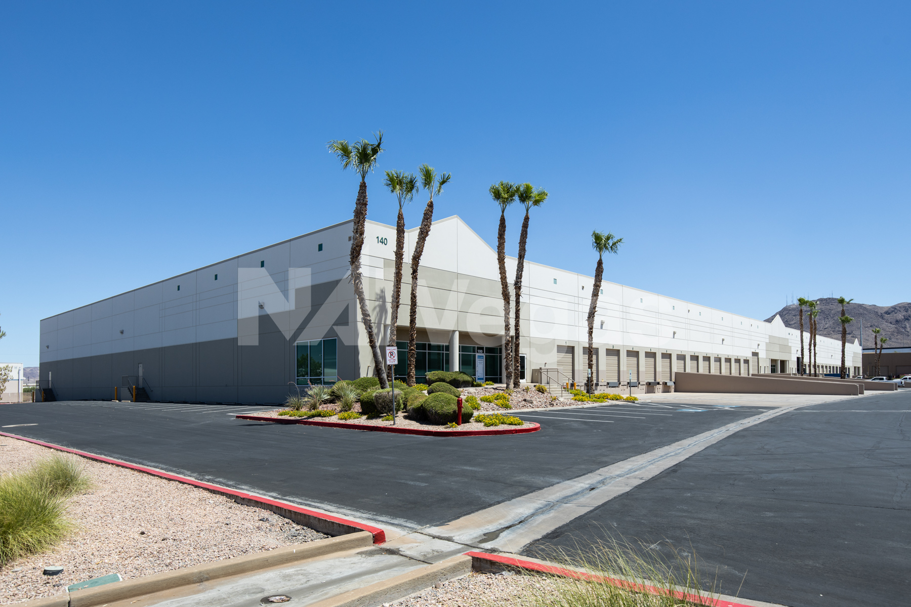 NAI Vegas Works Globally for new PIMA Door and Supply inc location