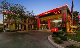 Red Roof Inn lit up at night