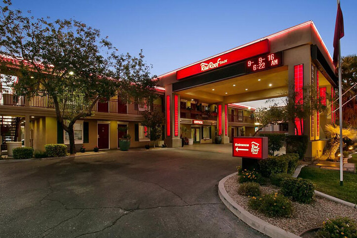 Red Roof Inn lit up at night