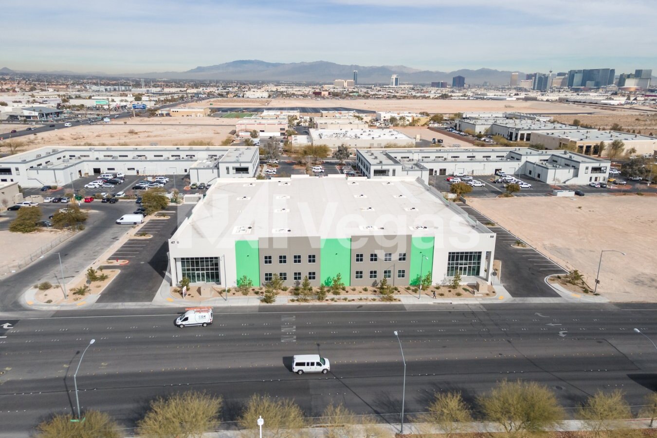 front of warehouse from drone view