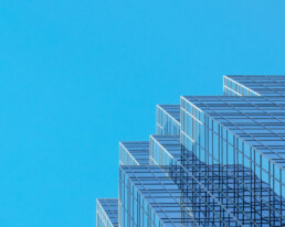 Commercial building against blue sky